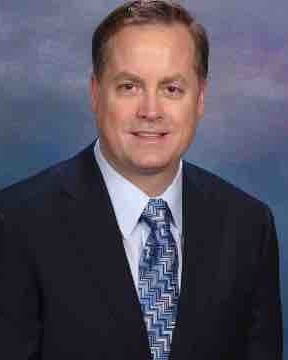 Portrait of Thomas Bassett, founder and principal of Bassett & Associates